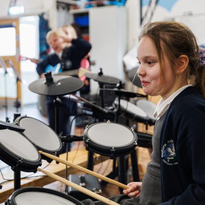 Student playing drums
